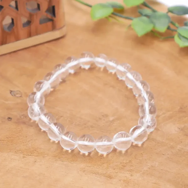 Bracelet en Cristal de Roche naturel de qualité supérieure, perles parfaitement translucides à l'éclat pur montées sur fil élastique résistant.