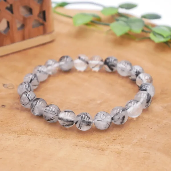 Pierre de Quartz Rutile Noir naturelle avec inclusions de Tourmaline noire pour protection