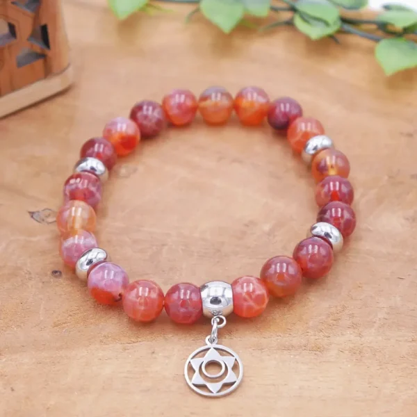 Bracelet en perles d'agate de feu aux reflets orange et brun avec billes acier inoxydable