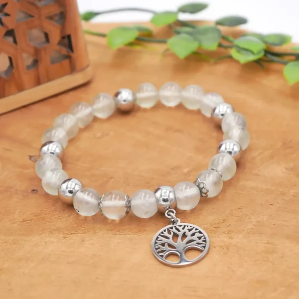 Bracelet en Prehnite naturelle vert d'eau avec inclusions de Tourmaline noire, perles en acier inoxydable (inox), montage artisanal de précision.