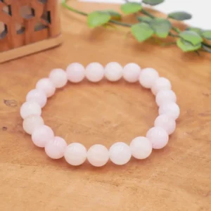 Bracelet en Morganite naturelle de qualité premium, perles translucides aux tons pastel rose, pêche et saumon sur fil résistant.