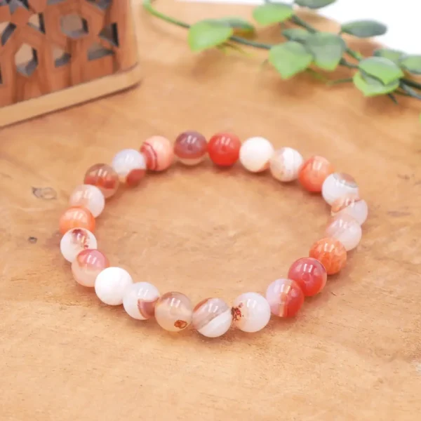 Bracelet en Sardonyx naturelle de qualité supérieure, perles rubanées aux strates de couleurs orange, marron, rouge et blanc sur fil résistant.