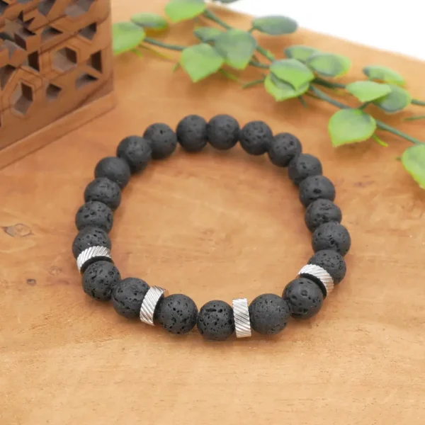 Bracelet homme en pierre de lave noire avec perles séparatrices en acier inoxydable