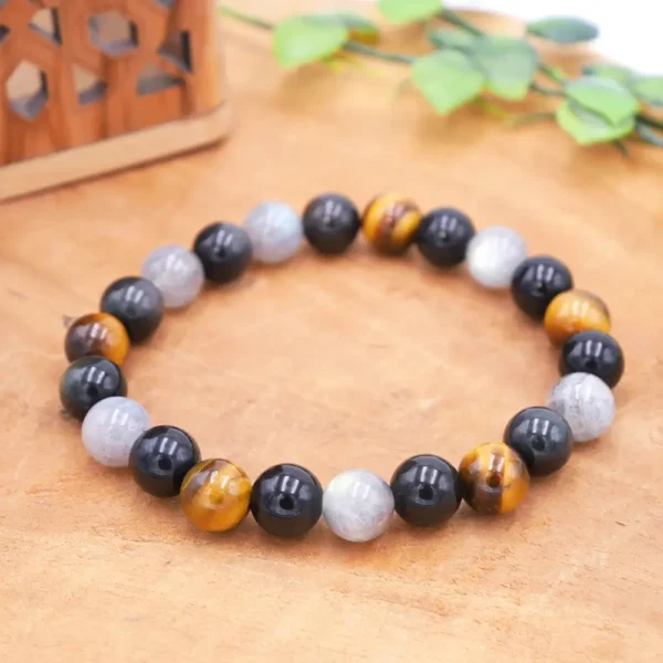 Bracelet trio protection en Labradorite aux reflets bleus, Obsidienne noire profonde et Œil de Tigre chatoyant, montage artisanal.