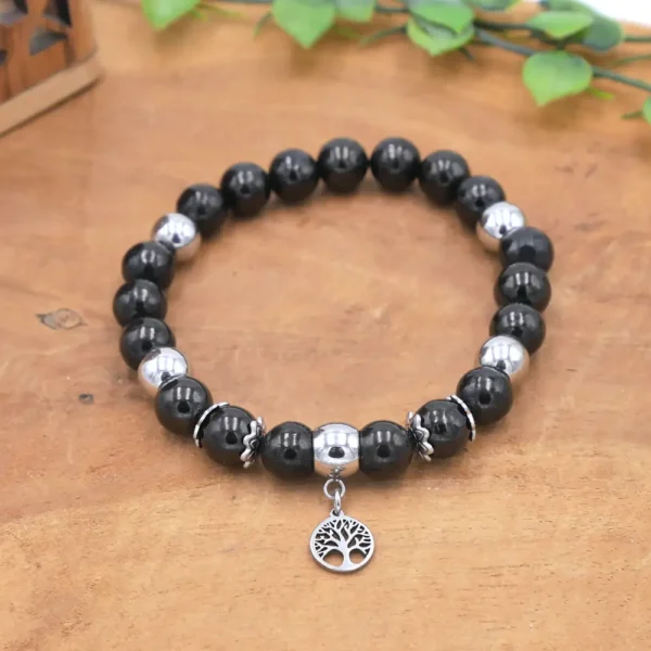 Bracelet en perles de jais véritable et intercalaires en acier inoxydable