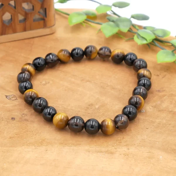 Bracelet artisanal pour homme et femme en perles naturelles d'Œil de Tigre, Tourmaline Noire et Quartz Fumé.