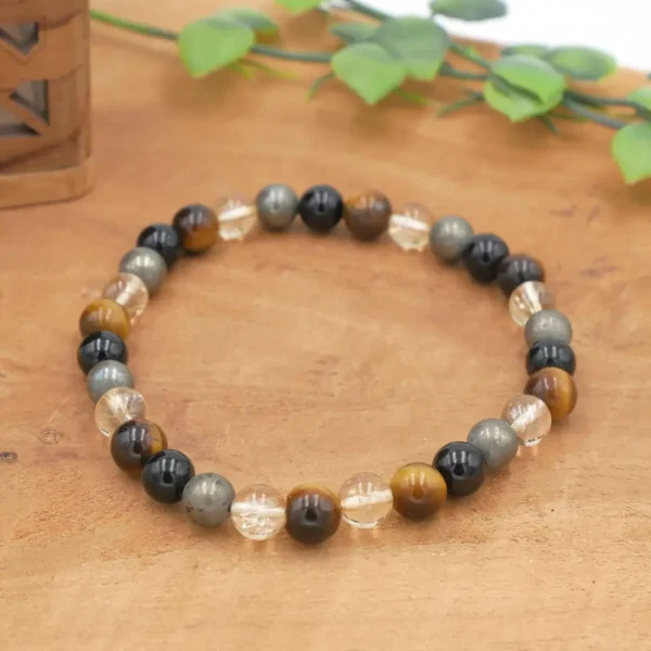 Photo Bracelet Citrine, Œil de tigre, Onyx, Pyrite en pierre naturelle, bijou fait main avec fil élastique.