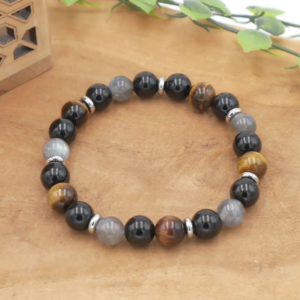 Bracelet en pierres naturelles de qualité en labradorite, obsidienne noire et oeil de tigre montées sur fil élastique.