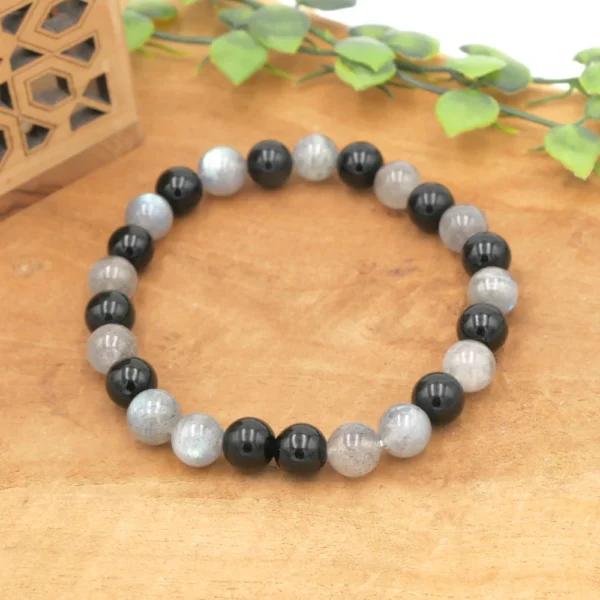 Bracelet en pierres naturelles de qualité de Labradorite et obsidienne noire. Taille bracelet et perles au choix. Fil élastique multibrin souple et résistant.