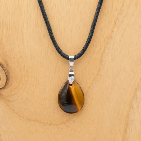 Pendentif en oeil de tigre naturel de qualité monté sur coton cordon ciré ou chaine acier inoxydable, taille au choix. Bélière acier inoxydable